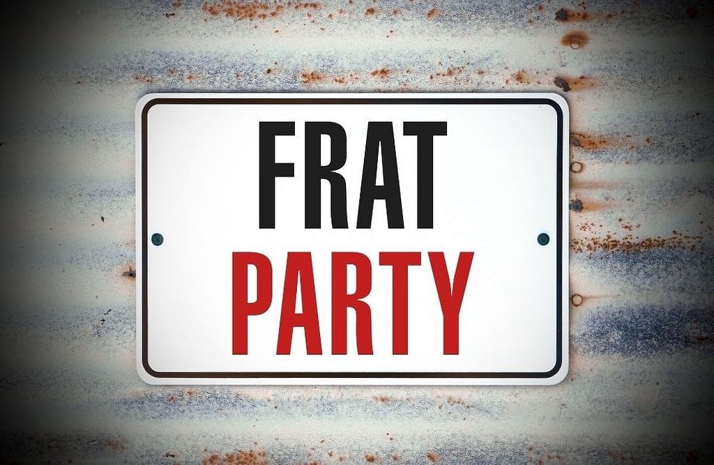 This is a photo of a sign reading “FRAT PARTY” drilled onto corrugated metal.. This image is used in the BPS Security article titled, “Will Having Security Guards at Fraternity Parties Eliminate Drug and Sexual Abuse?”