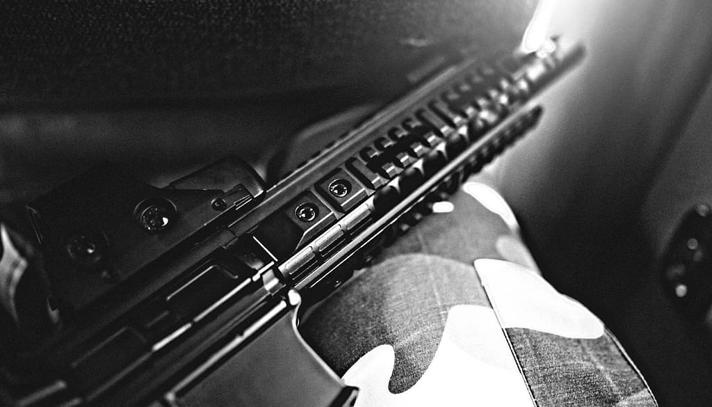 This is a black and white photo of an automatic rifle. This image is used in the BPS Security article titled, “Protecting School Children with Automatic Weapons?! We Have some Better Ideas to when combatting school shootings”.
