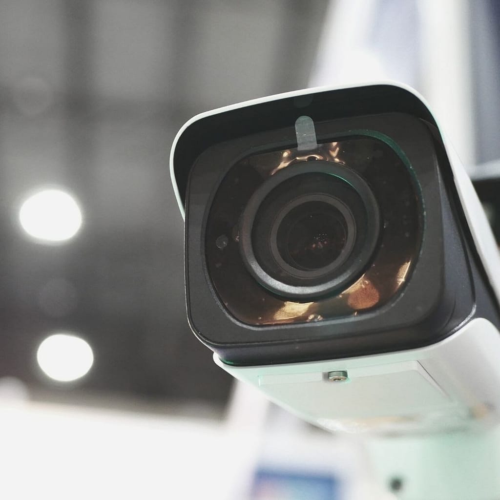 This is a closeup image of a square security camera. This image is used for a BPS Security Blog discussing the best security system for a company.