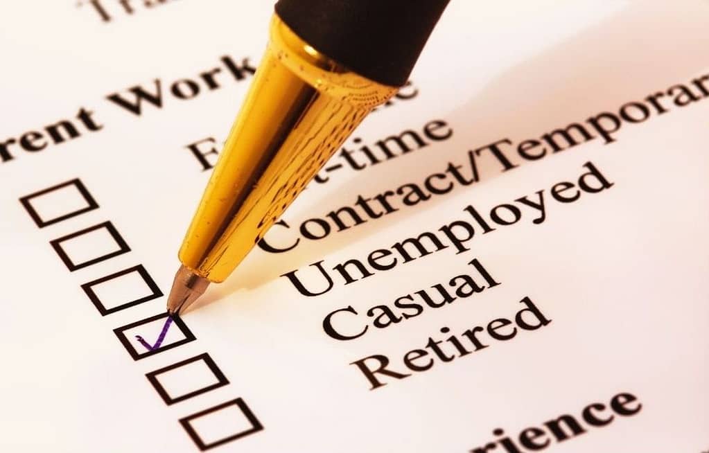 This is an image of a form that an individual would fill out to provide information about themselves. The image is hyper focused on a section that reads, “current work”, and a pen is checking off the option for “unemployed.” This image is used in the BPS Security Article titled, “How Viral Videos Can Destroy the Security Industry”.